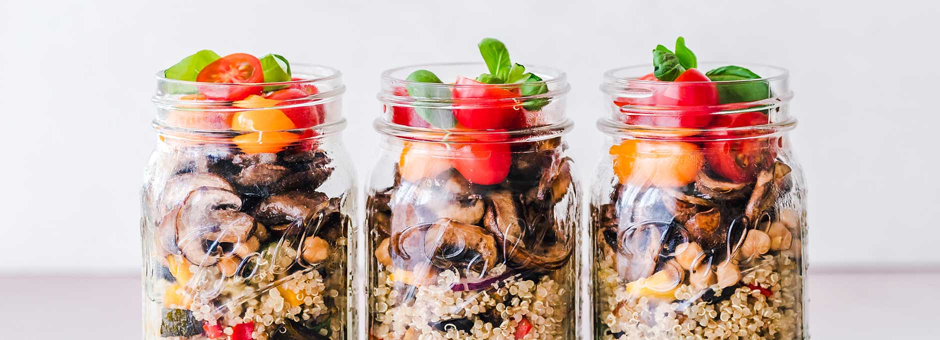 Meal prepped food stored in mason jars