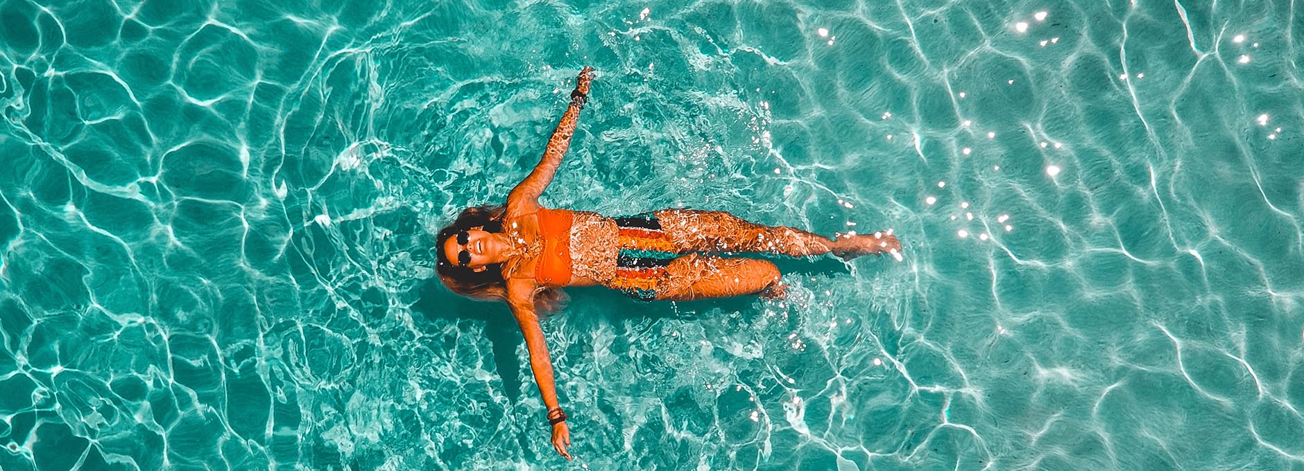 Woman swimming in pool