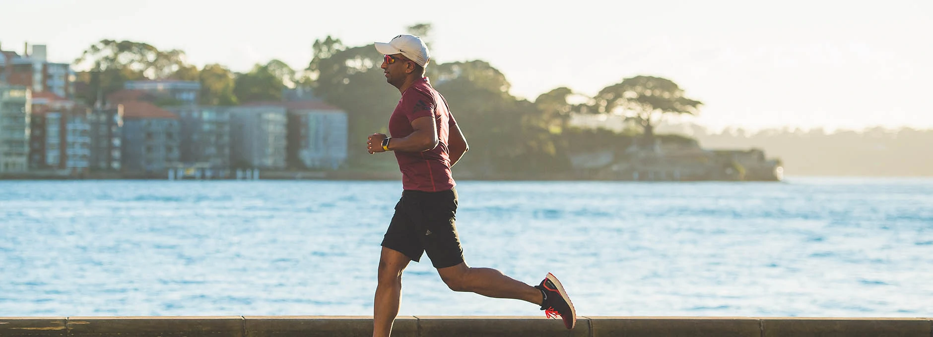 Man running on seafront