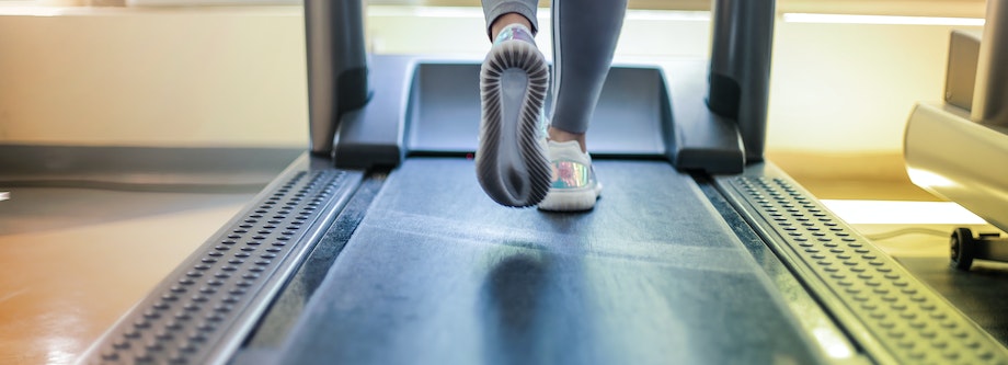 Person beginning exercise on treadmill